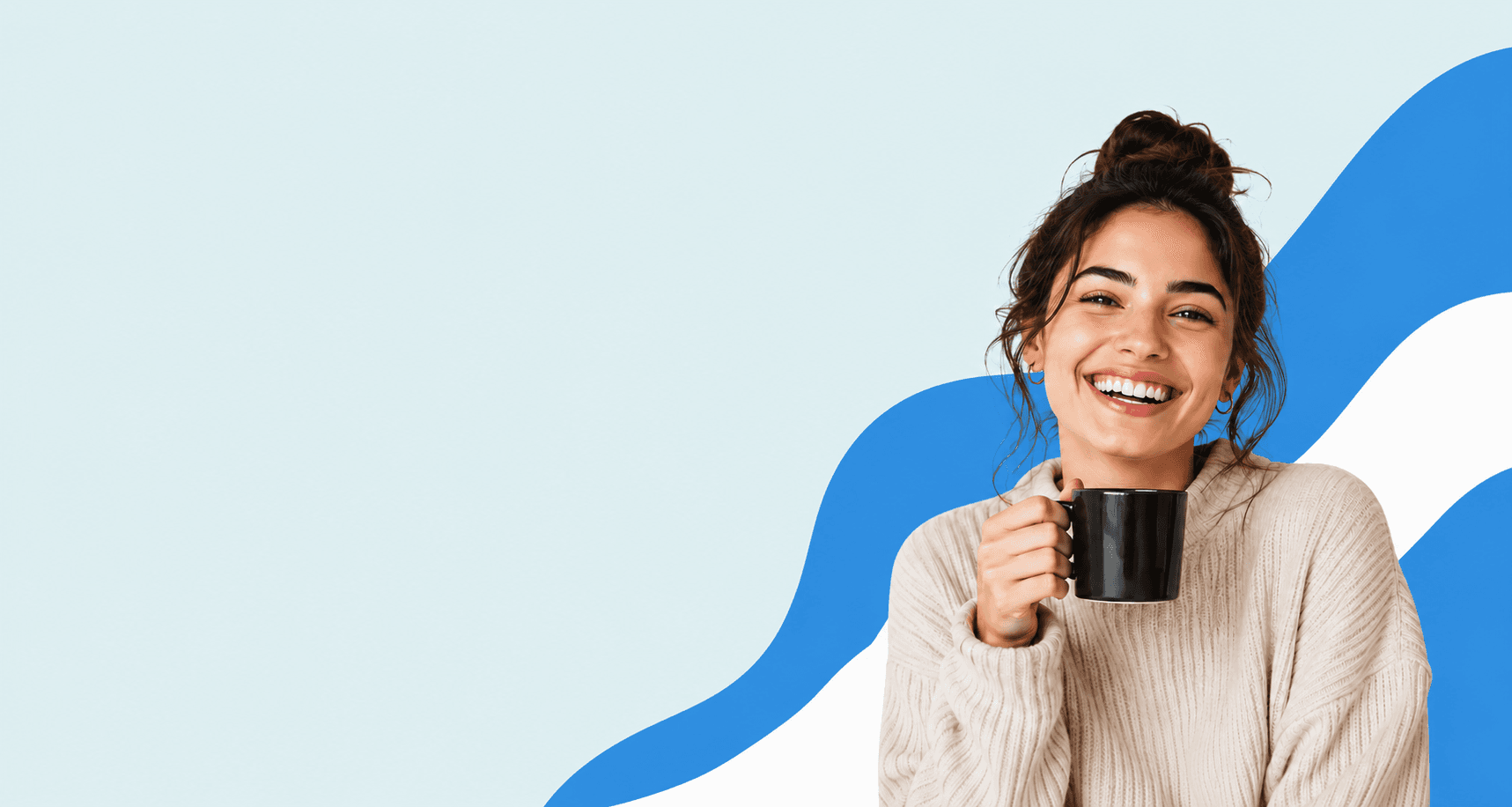 Smiling Alta Dental patient holding a mug
